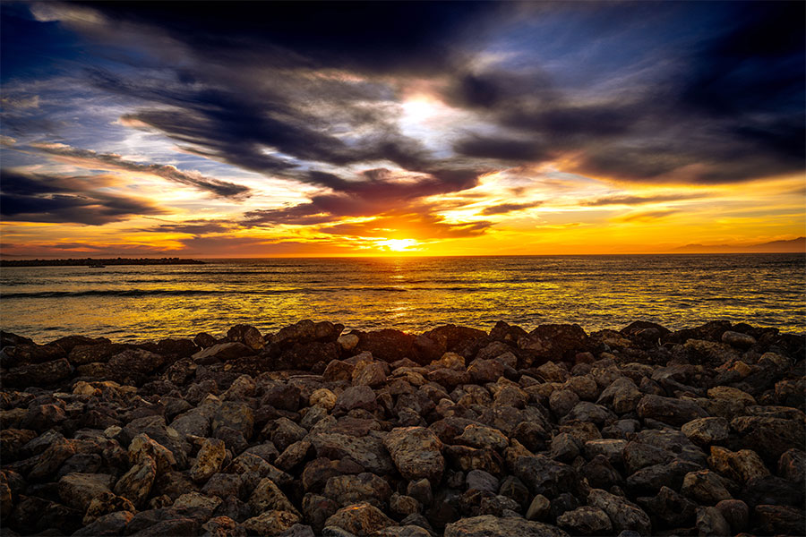 Ventura Key beach photography with rocky shoreline and sunset light