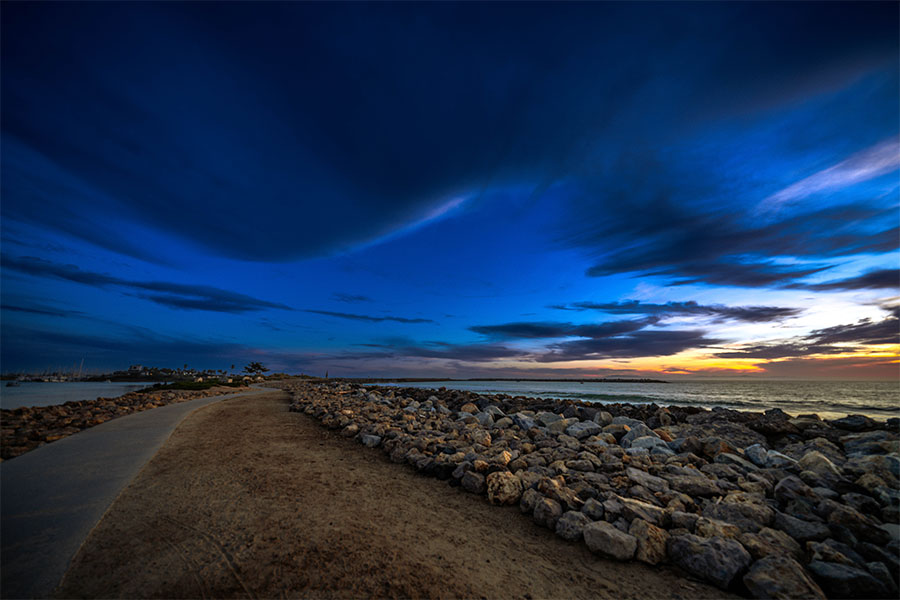 Ventura Key beach photography with rocky shoreline and sunset light