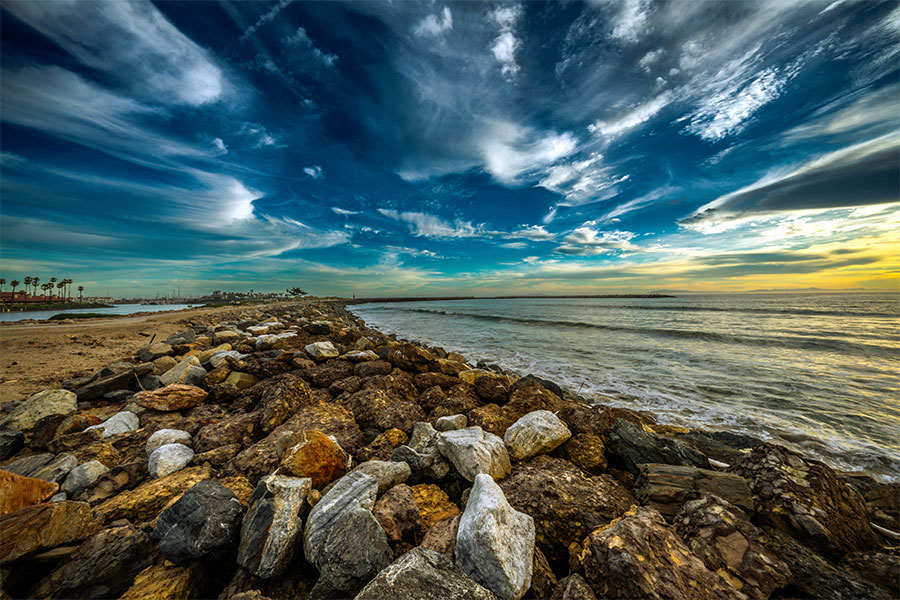 Ventura Key beach photography with rocky shoreline and sunset light