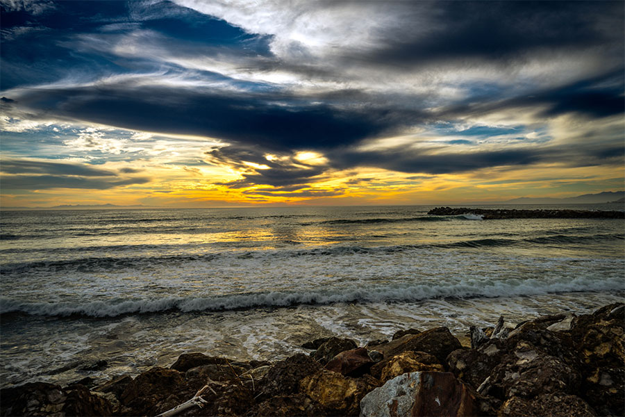 Ventura Key ocean photography with waves and glowing sunset horizon
