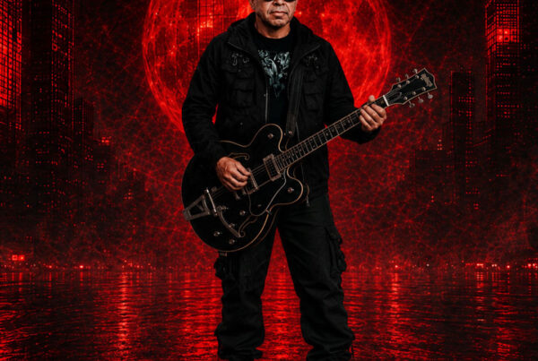 Randley Morales playing a Gretsch guitar in a red cyberpunk cityscape for The Geometry of Sound.